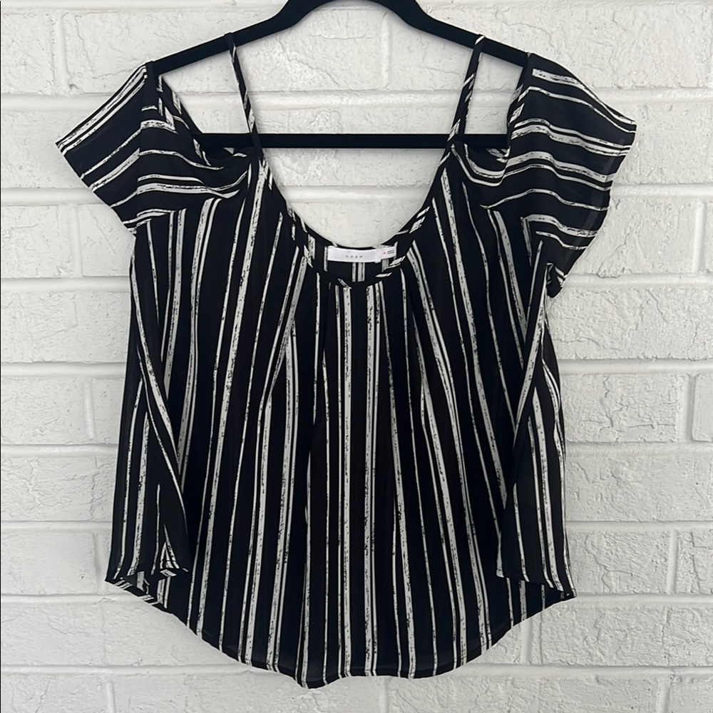Lush Black and White Asymmetrical Cut Out Blouse